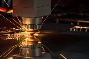 The fiber laser cutting machine cutting  machine cut the metal plate. The hi-technology sheet metal manufacturing process by laser cutting machine.